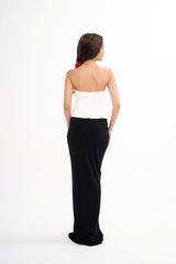 Detail view of the one-shoulder strap and the elasticated back or side of the Magda Butrym top, available for rental in Kuala Lumpur, Malaysia