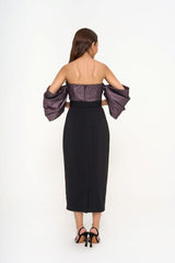 Back view of the Badgley Mischka dress, highlighting the concealed zip fastening and the sleek drape of the fabric