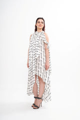 The designer dress styled, showcasing the unique draped design and the full-length silhouette.