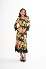 Dolce & Gabbana floral print midi dress for rental, featuring a vibrant print and elegant lace trim.
