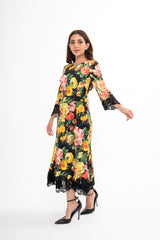 The designer dress styled, showcasing the flattering silhouette and the graceful fluted hem.