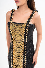 Close-up detail of the mini dress, showcasing the dense layering of the gold sequins and chains, available for rental in Kuala Lumpur, Malaysia.