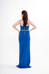 Back view of the Balmain Crystal Snake dress, emphasizing the fluid movement of the maxi length, available for rental in Kuala Lumpur, Malaysia.