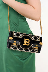 Model holding Balmain BBuzz Crystal Evening Bag clutch rental Sri Hartamas KL