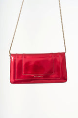 Bvlgari Serpenti bag styled as a crossbody, showcasing the elegant drop and versatile gold chain strap