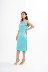 Christian Dior turquoise midi dress for rental, featuring an asymmetric silhouette and glittering embroidery, available with doorstep delivery across Malaysia.