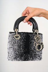 Close-up of the Dior sequined cannage stitching and the iconic D.I.O.R. charm details.