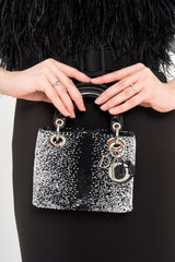 Mini Lady Dior close up view showcasing the D.I.O.R charm details, available for rent at Clarissima boutique at Sri Hartamas KL.