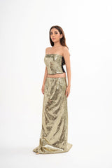 The designer crop top styled, showcasing the strapless neckline and the overall glamorous, sequined texture