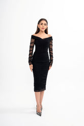 Dolce & Gabbana 'La Petite Robe Noire' dress for rental, featuring a black cotton-blend with ruched design and crossover front, photographed in Sri Hartamas, Malaysia.