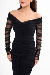 Close-up detail of the dress, highlighting the texture of the tulle and cotton-blend fabric and the delicate ruched detail.