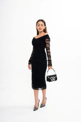 The D&G dress styled, showcasing the flattering fit, midi length, and elasticated cuffs.