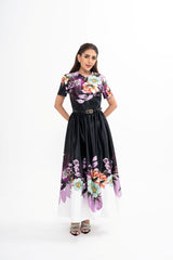 Elie Saab A-line midi cocktail dress in black and purple floral print with cinched waist for rental, photographed in Sri Hartamas, Malaysia.