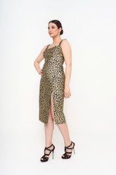 Carolina Herrera midi dress in metallic black and gold leopard-jacquard with front split for rental, photographed in Sri Hartamas, Malaysia.