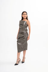 The Mugler dress styled on a model, showcasing the asymmetric cut, the bustier fit, and the flattering silhouette.