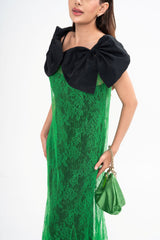 Close-up detail of the gown, highlighting the texture of the lace and the structure of the paneled design, available for rental.