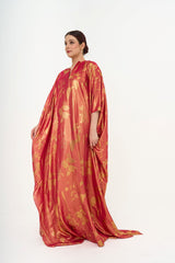 Full-length view of the Oscar de la Renta gown on a model, emphasizing the fluid drape and elegant, relaxed fit. For rental at Clarissima Sri Hartamas boutique.