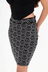 Close-up detail of the skirt, highlighting the sparkling crystal monogram pattern and the texture of the mid-weight fabric, available for rental in Kuala Lumpur, Malaysia.