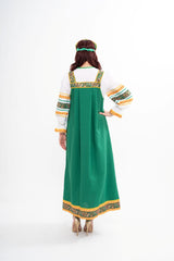 Full view of the Russian sarafan and rubashka blouse, emphasizing the traditional fit and vibrant colour of the costume.