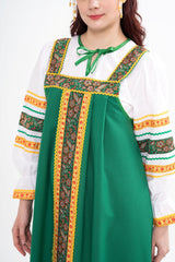 Close-up of the Folksong dress, highlighting the material, elements and embroidered detailing.