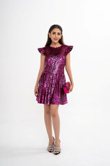 Saint Laurent mini dress for rental, featuring a pink animal print with all-over sequin embroidery and silk lining, photographed in Sri Hartamas, Malaysia.