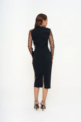 Back view of the Stella McCartney dress, highlighting the concealed zip fastening and the subtle back vent for ease of movement, available for rental in Kuala Lumpur, Malaysia.