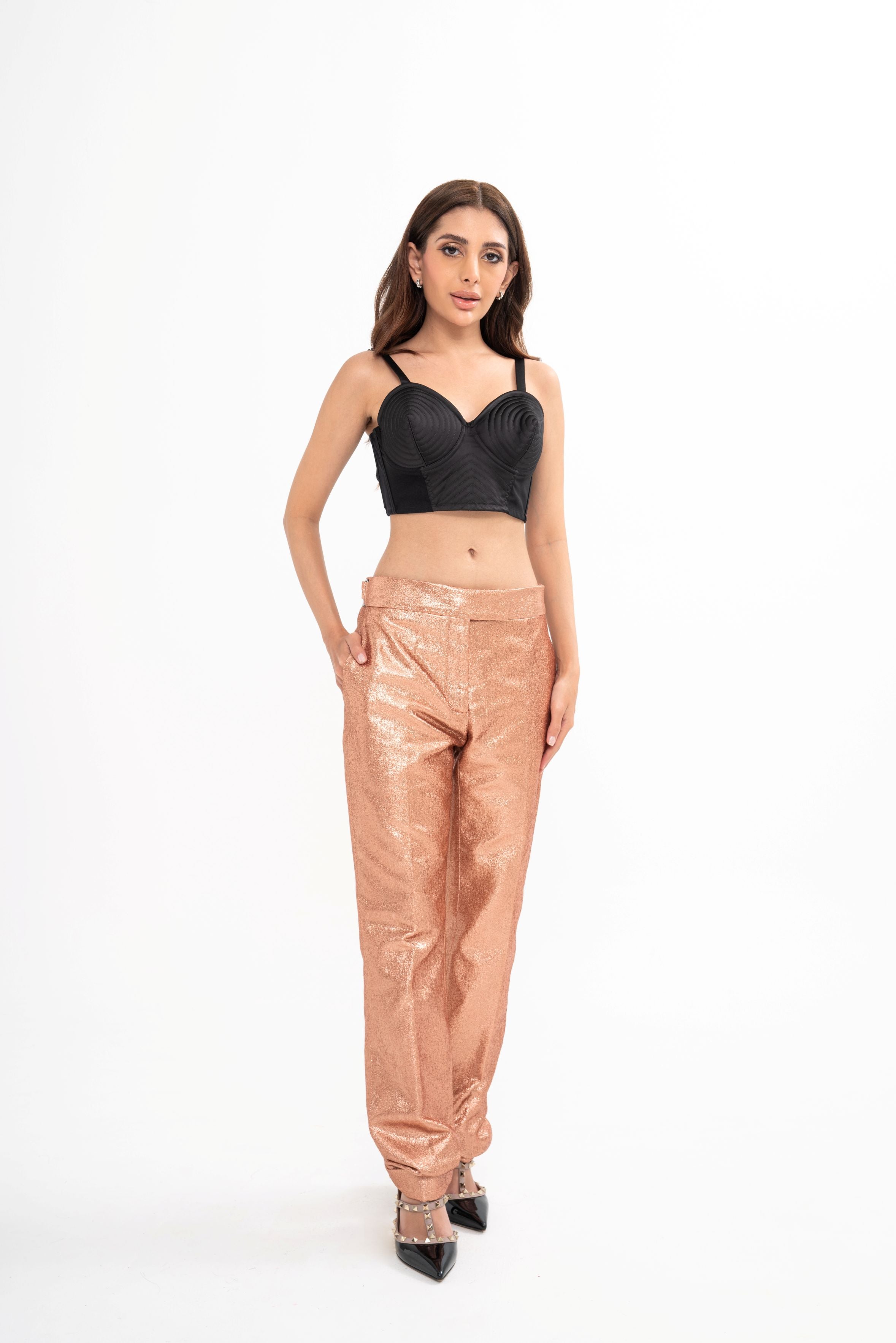 Tom Ford straight-leg trousers for rental, made from iridescent rose gold glittered sablé fabric with pressed creases, photographed in Sri Hartamas, Malaysia