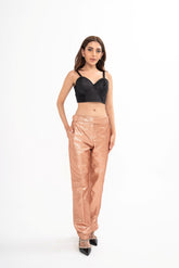 Tom Ford straight-leg trousers for rental, made from iridescent rose gold glittered sablé fabric with pressed creases, photographed in Sri Hartamas, Malaysia