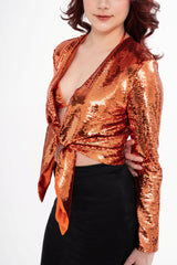 Close-up of the blouse, highlighting the texture of the copper sequins and the tie-front closure detail, available for rental in Kuala Lumpur, Malaysia.