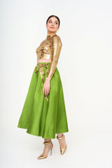 The skirt on a model, showcasing the structured yet fluid drape and the elegant length, designed to be worn at the waist. For rent at Clarissima Sri Hartamas.