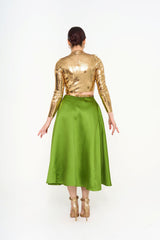 Rear view of the Valentino emerald ribbon skirt, illustrating the side zip fastening and the fully lined interior, available for rental in Kuala Lumpur, Malaysia