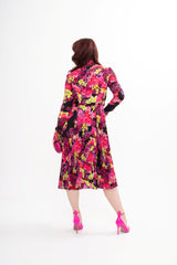 Detail of the concealed button fastenings through the front and the finish of the elegant neckties on the Versace dress.