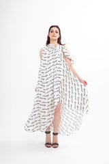 Balenciaga silk draped dress for rental, featuring all-over logo print and an asymmetrical silhouette, photographed in Sri Hartamas, Malaysia.