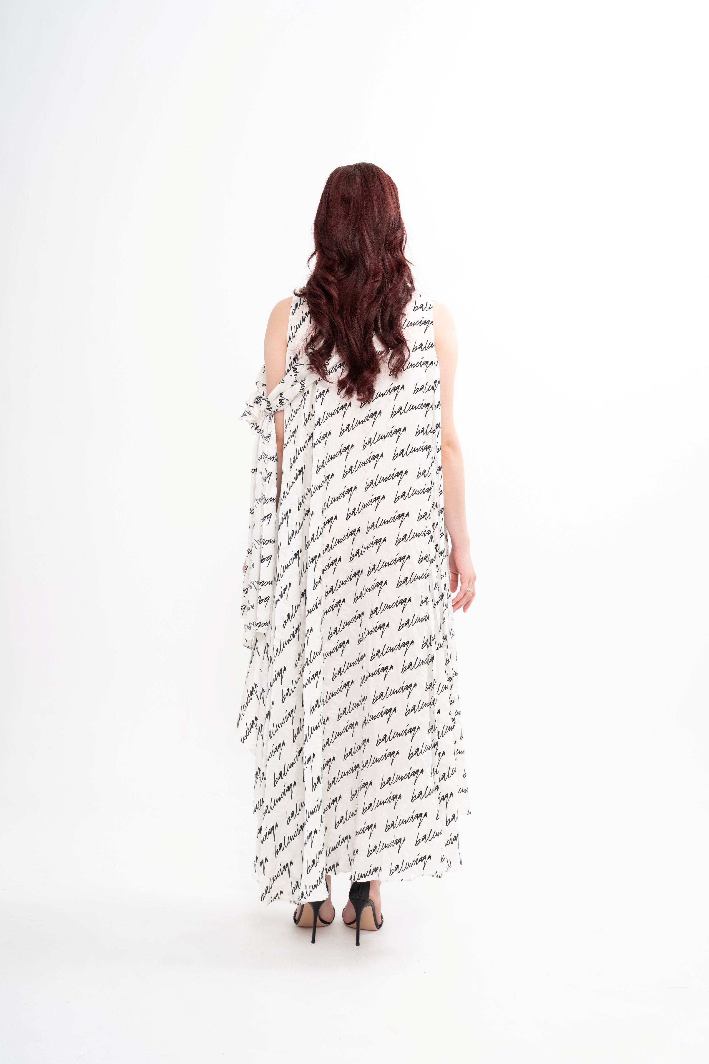 Detail of the Balenciaga silk dress, emphasizing the elegance and movement of the fabric, available for rental in Kuala Lumpur, Malaysia