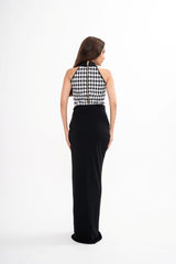 Detail of the zip fastening along the back and the snap closure at the base of the Balmain bodysuit.