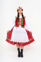 Full five-piece Polish Cracow folk ensemble, showing the red floral skirt and embroidered vest with pom-poms.