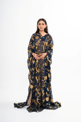 The designer gown styled, showcasing the long, fluid silhouette and the hook-fastening keyhole at the front.