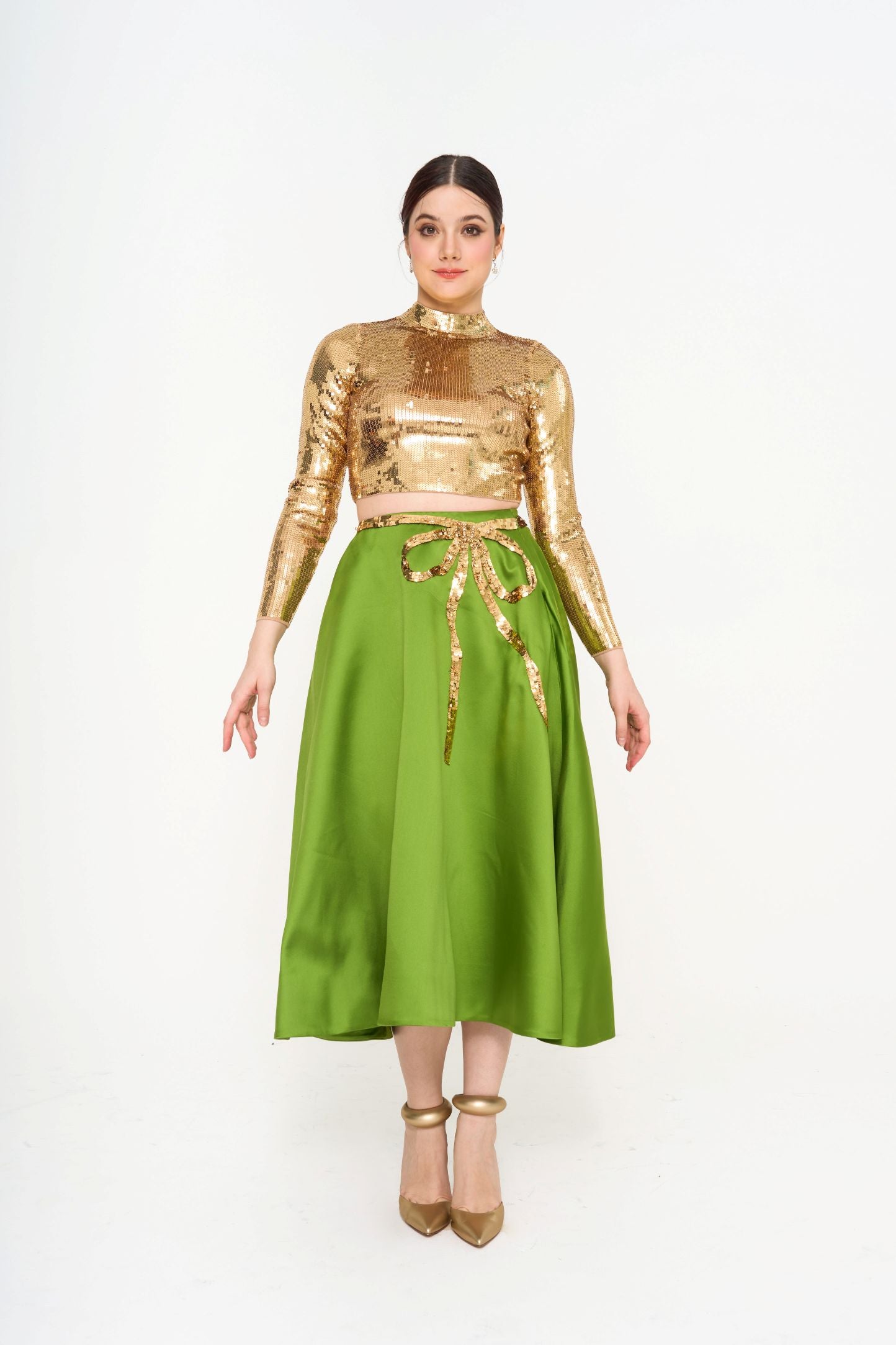 Valentino Garavani mid-length skirt in silk-blend duchesse satin with shimmering emerald sequin ribbon embellishments, available for rent in Sri Hartamas, Malaysia.
